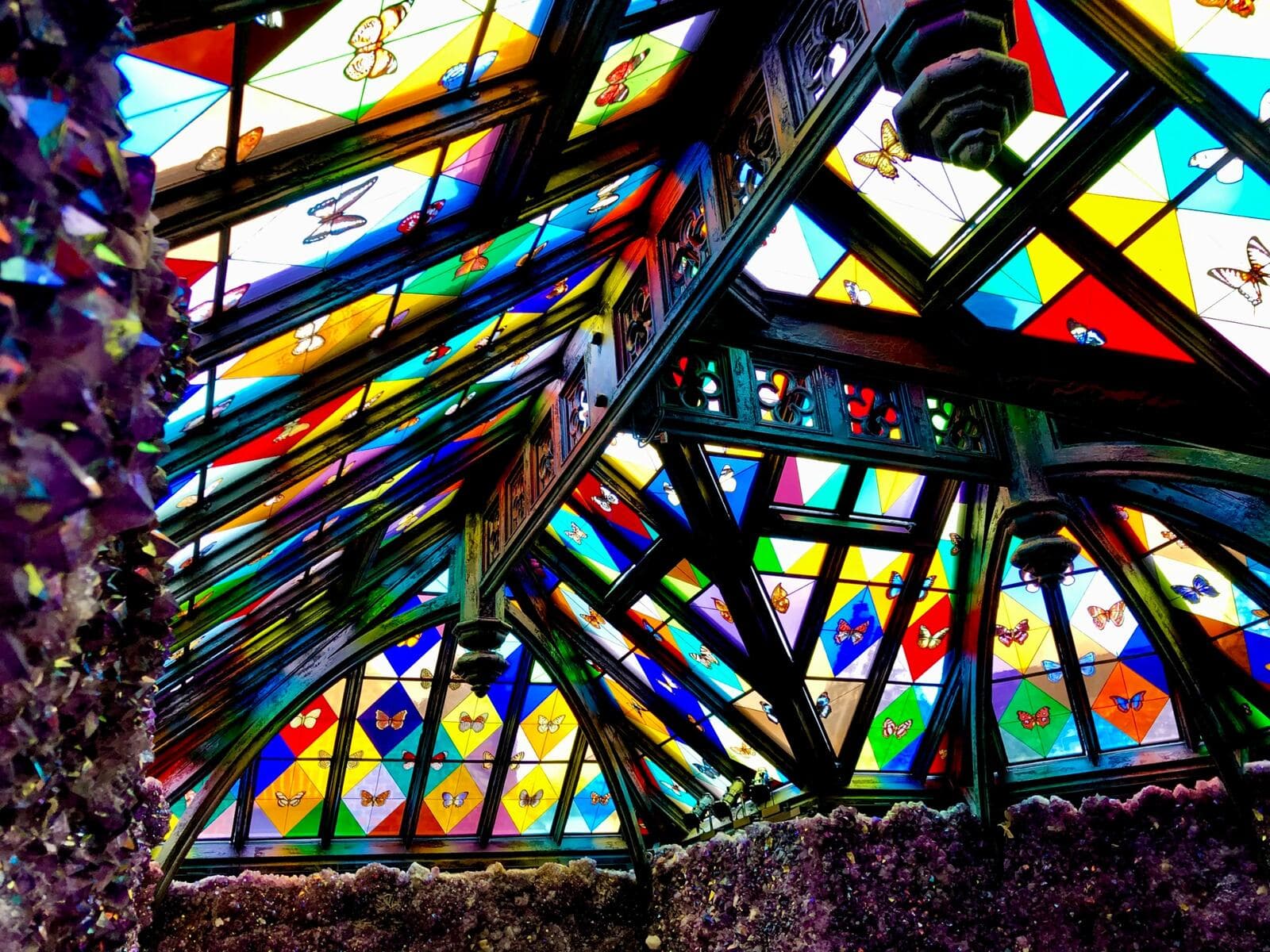 Finished stained-glass roof panels seen against the conservatory structure