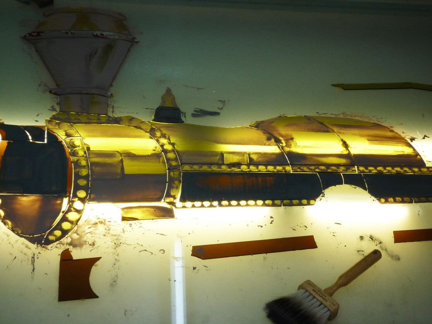The illuminated train panel lit from behind in the studio