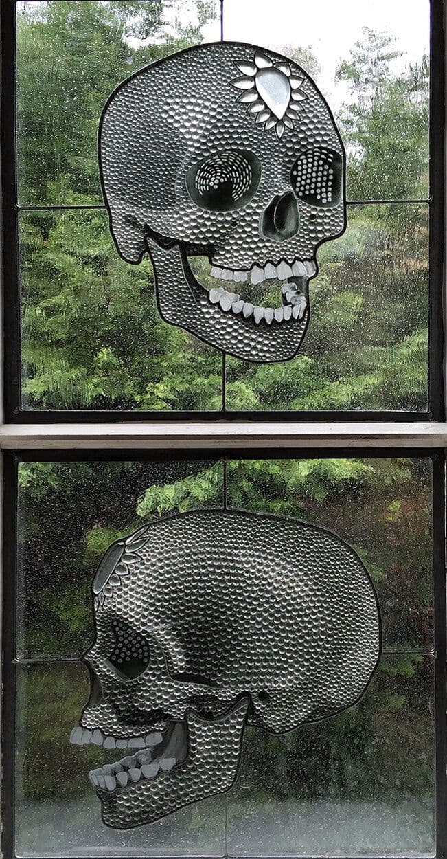 Two completed skull windows installed one above the other
