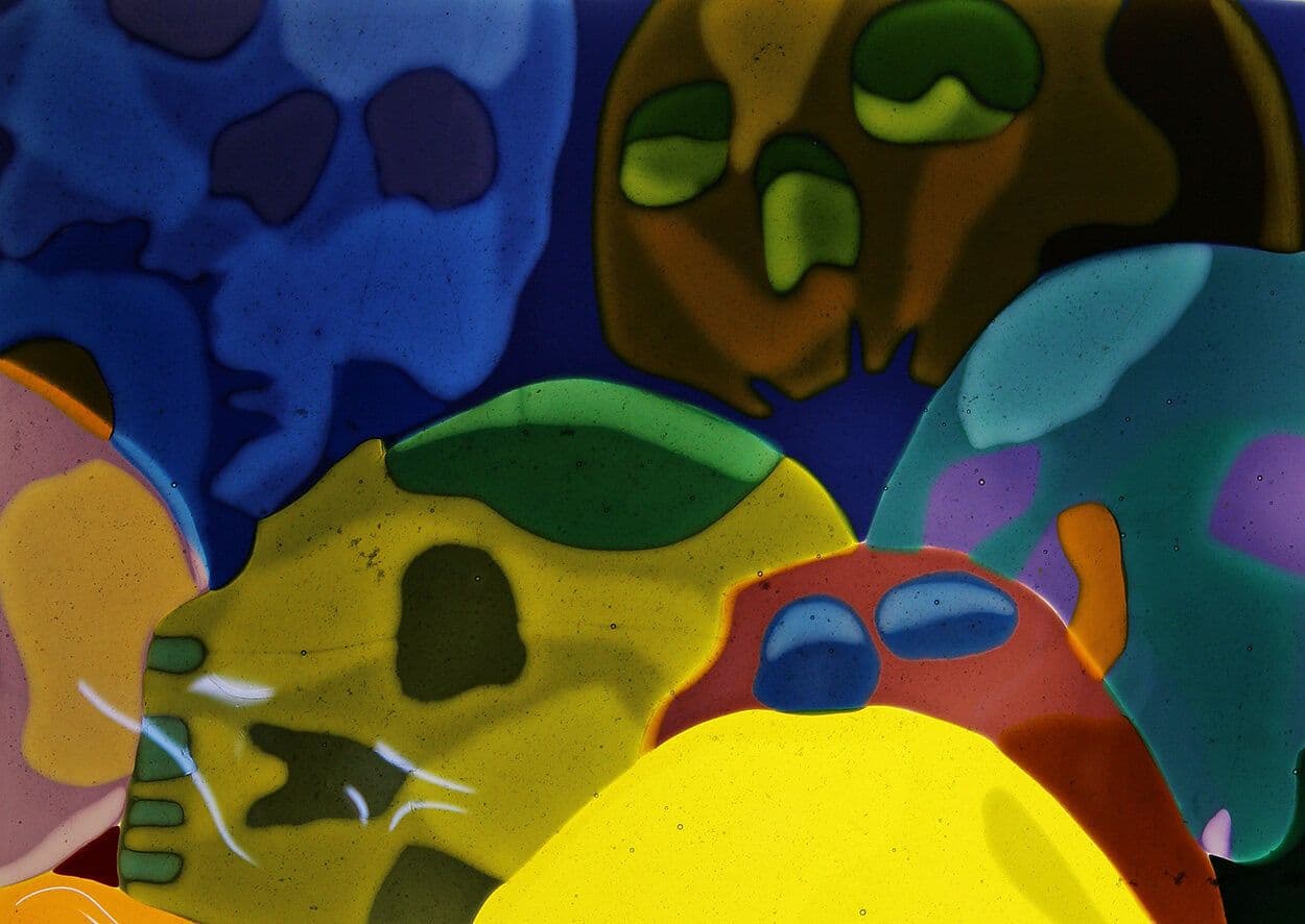 Overlapping pieces of brightly coloured mouth-blown glass